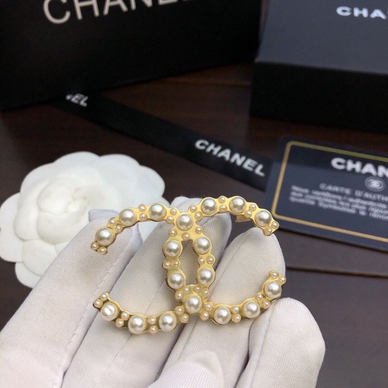 Ch**el brooches